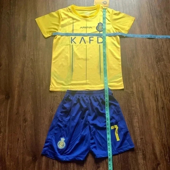 Cristano Ronaldo Al Nassr FC Soccer Jersey, Shorts Set 2023/24 Kids Home M NWT - Picture 3 of 7
